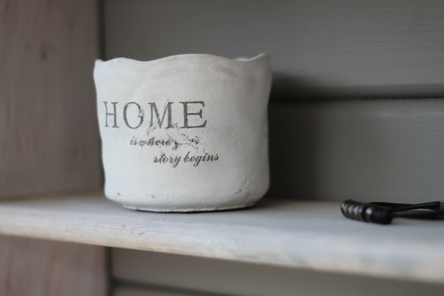 pottery with custom engraving saying "home"